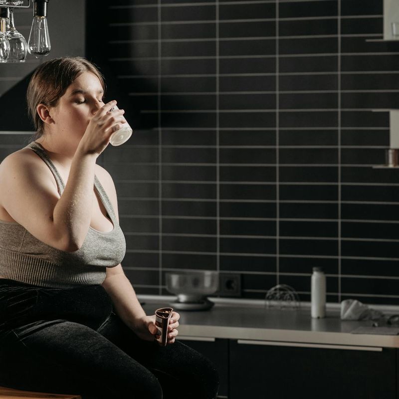 Close-up on a person's focused expression during a calm exercise.